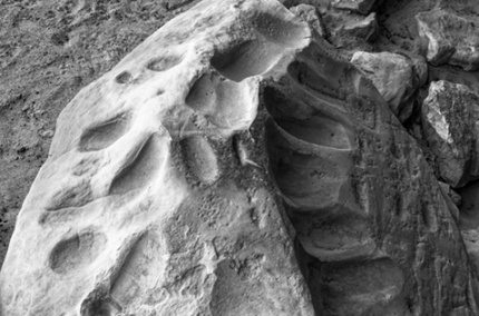 ManyHandsGrindingStone